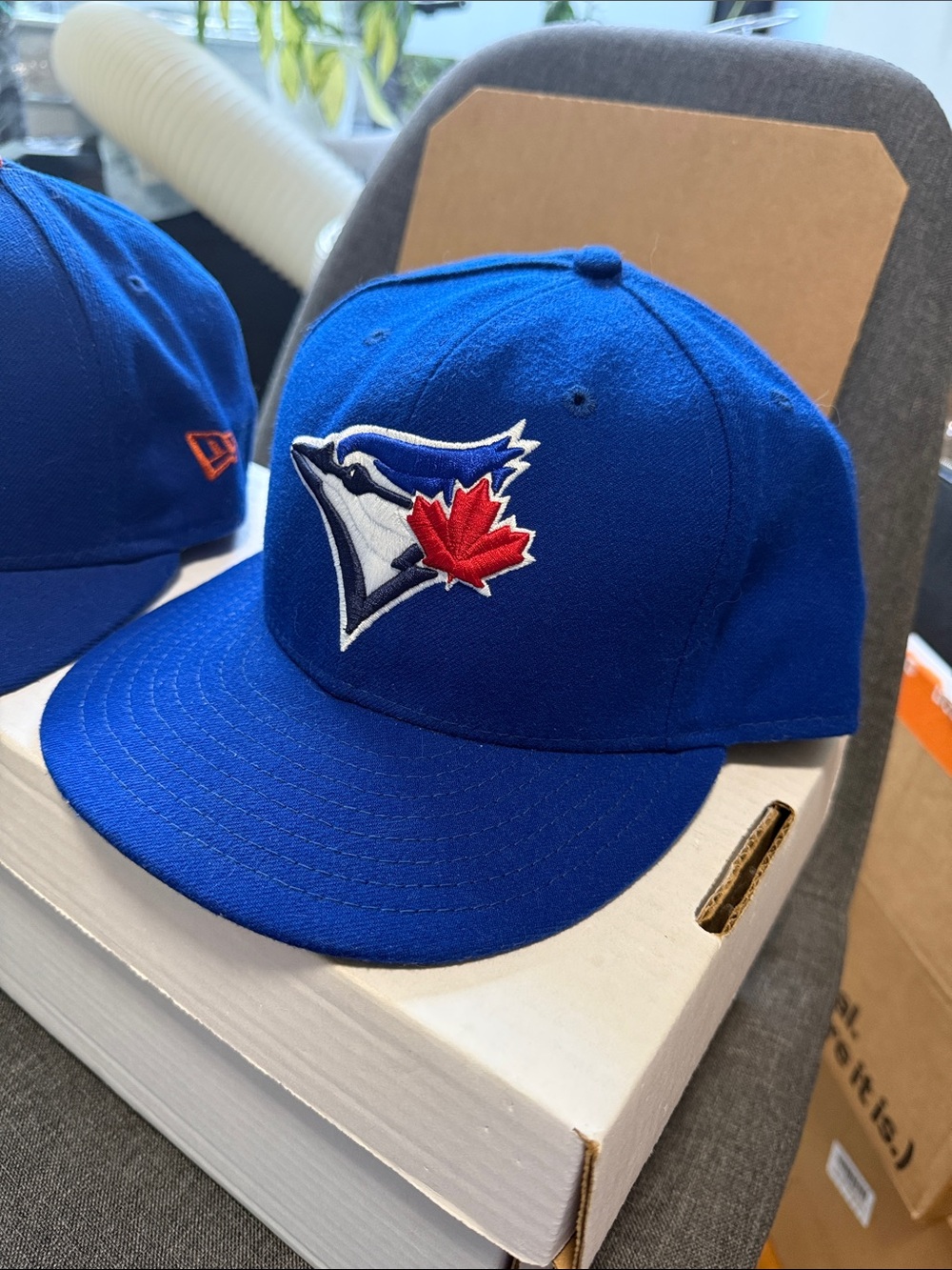 New Era Blue Toronto Blue Jays Fitted Baseball Cap with Red Maple Leaf Logo